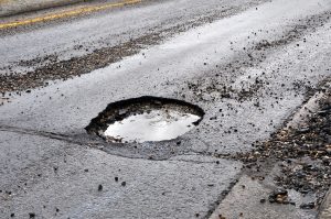 Pothole Causes Motorcycle Accident on I-40